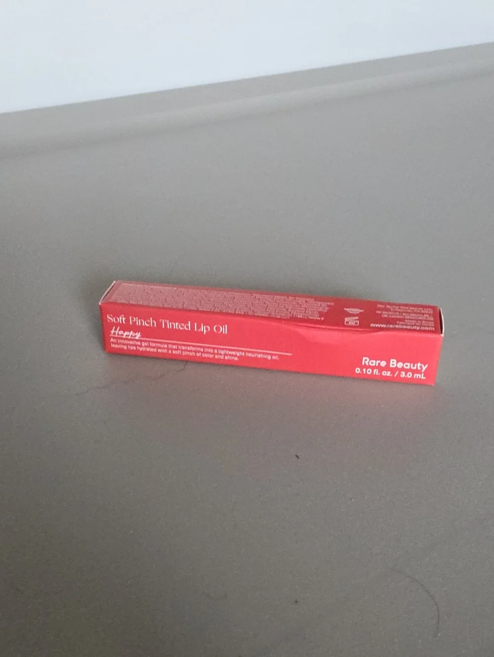 Rare BEAUTY lip Oil - HAPPY